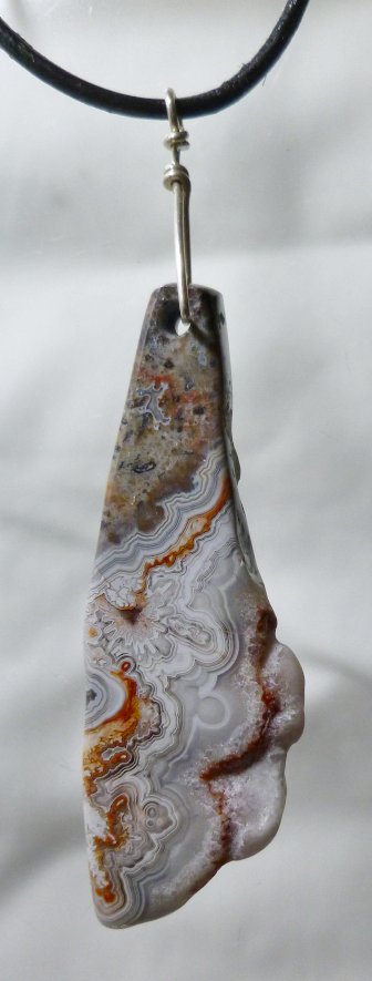 Crazy Lace agate talisman pendant handmade in USA by Mystic Merchant agate pendant focal bead Handmade by Billy Mason unique gold Jewelry pictures and info handmade silver jewelry including Cuff Bracelets Rings Earrings Cuff links cufflinks pendants jeweler Amulets Handmade Jewelry Handmade